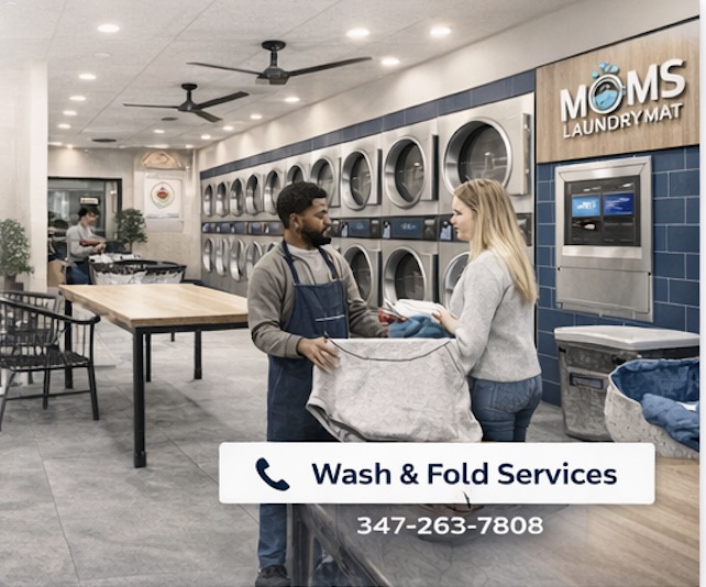 Customer handing off a laundry bag for pickup and delivery service at Mom's LaundryMat